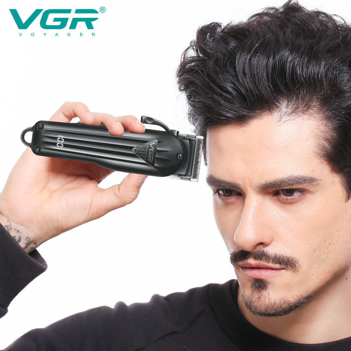 Man using the VGR V-282 cordless hair clipper for a professional-style haircut